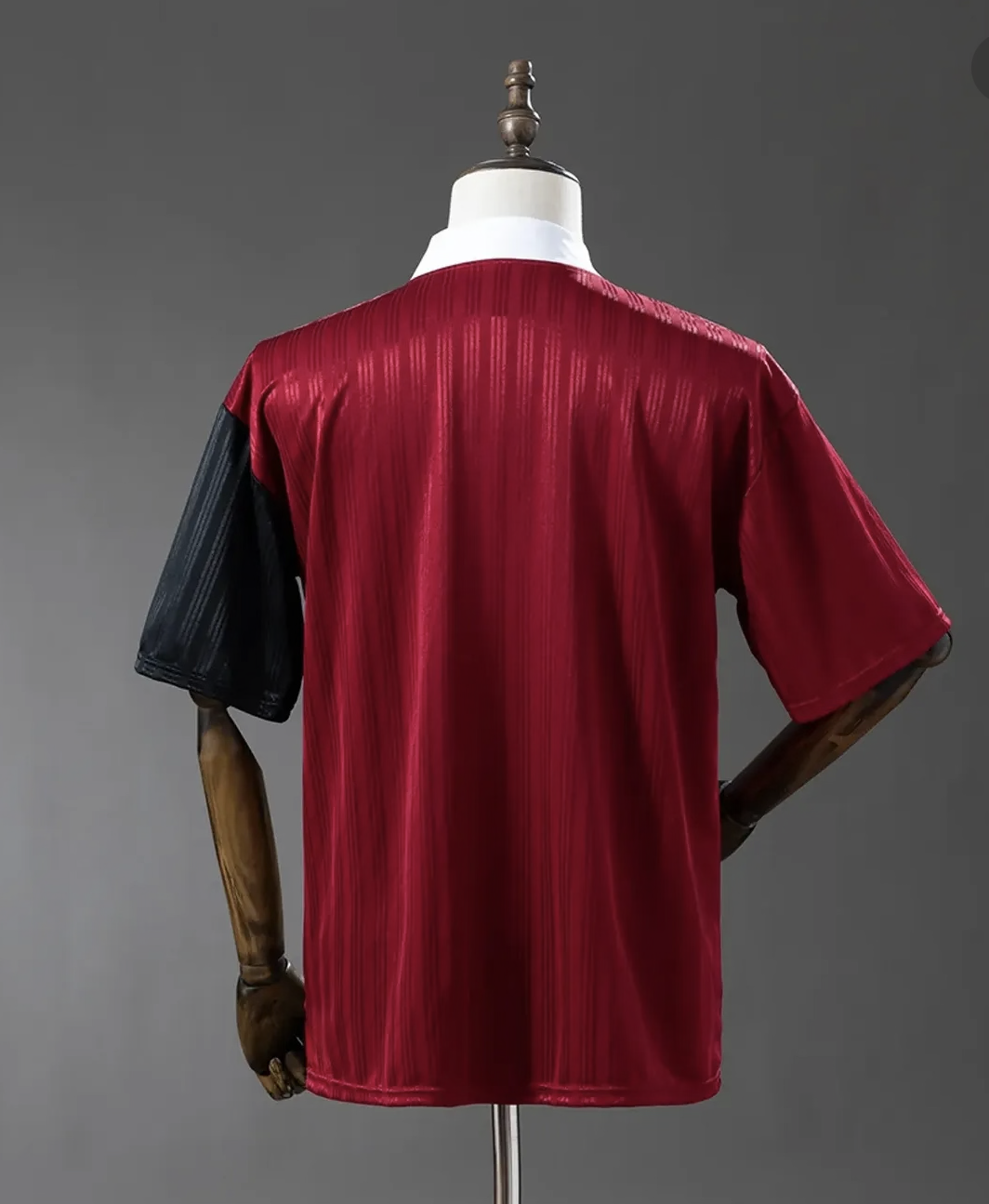 Red and black Adidas OASIS TOUR short sleeve soccer jersey from the Bolt Makers Arms edition, featuring bold design and branding.