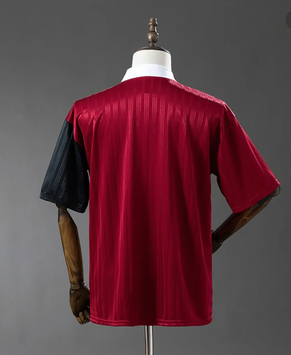 Red and black Adidas OASIS TOUR short sleeve soccer jersey from the Bolt Makers Arms edition, featuring bold design and branding.