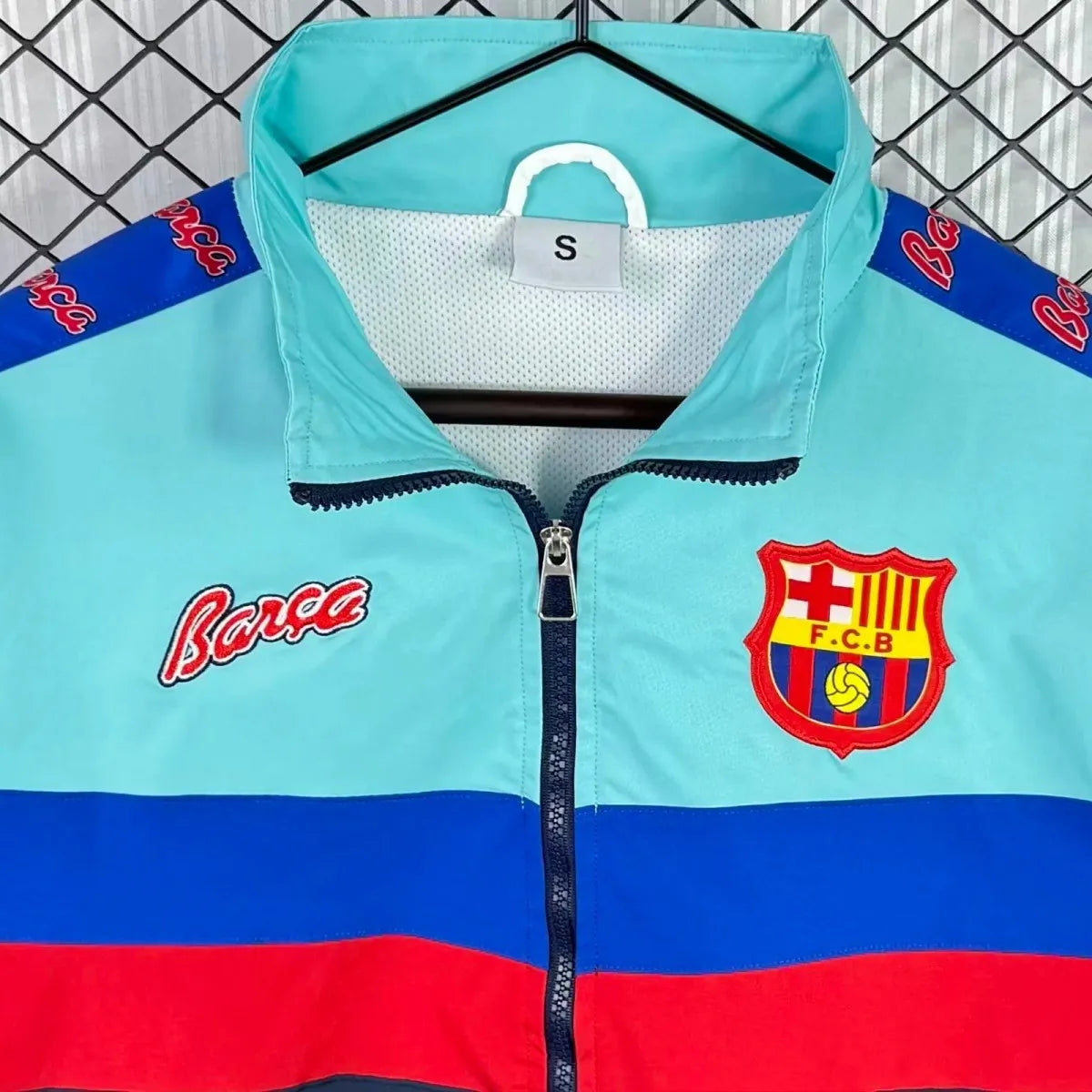 Barcelona FC 95/97 retro long sleeve track jacket in navy with yellow accents, featuring team logo and vintage design.