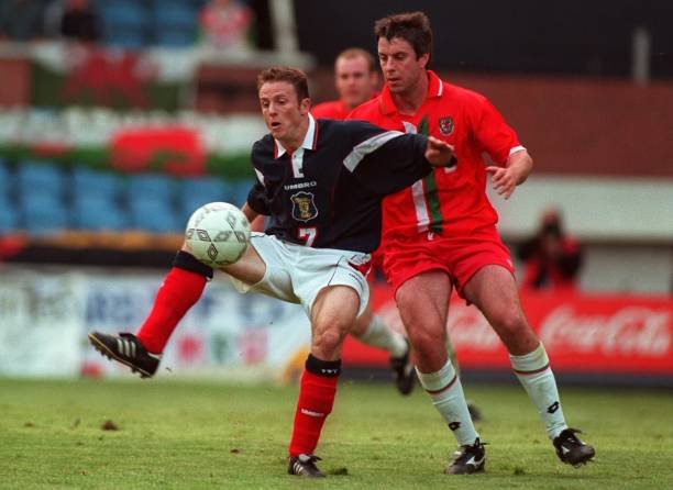 Wales 🏴󠁧󠁢󠁷󠁬󠁳󠁿 1996/98 Home Jersey. - World Cup Retro Soccer Shop