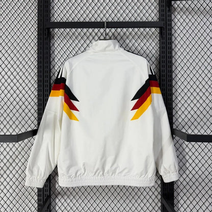 Long sleeve West Germany 1990 retro track jacket with classic design, featuring team colors and vintage soccer style.