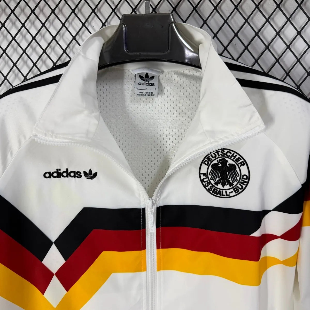 Long sleeve West Germany 1990 classic retro track jacket with vintage soccer design, from World Cup Retro Soccer Shop.