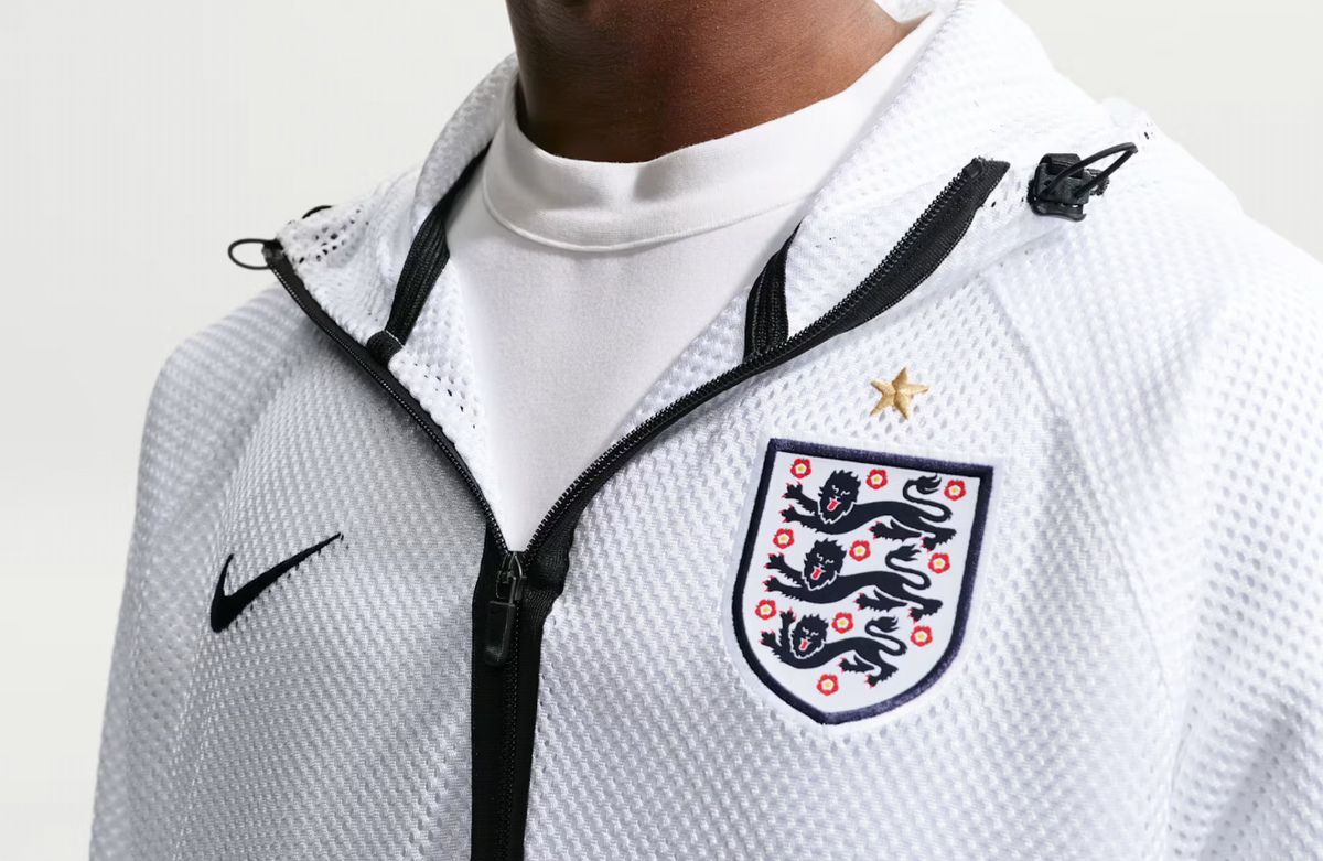 England World Cup 2026 warm-up jacket, long sleeve sportswear by World Cup Retro Soccer Shop, featuring England team colors and logo.