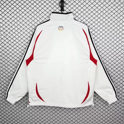 Germany 2005/06 all-weather retro soccer track jacket with long sleeves, featuring team graphics and classic sports design.