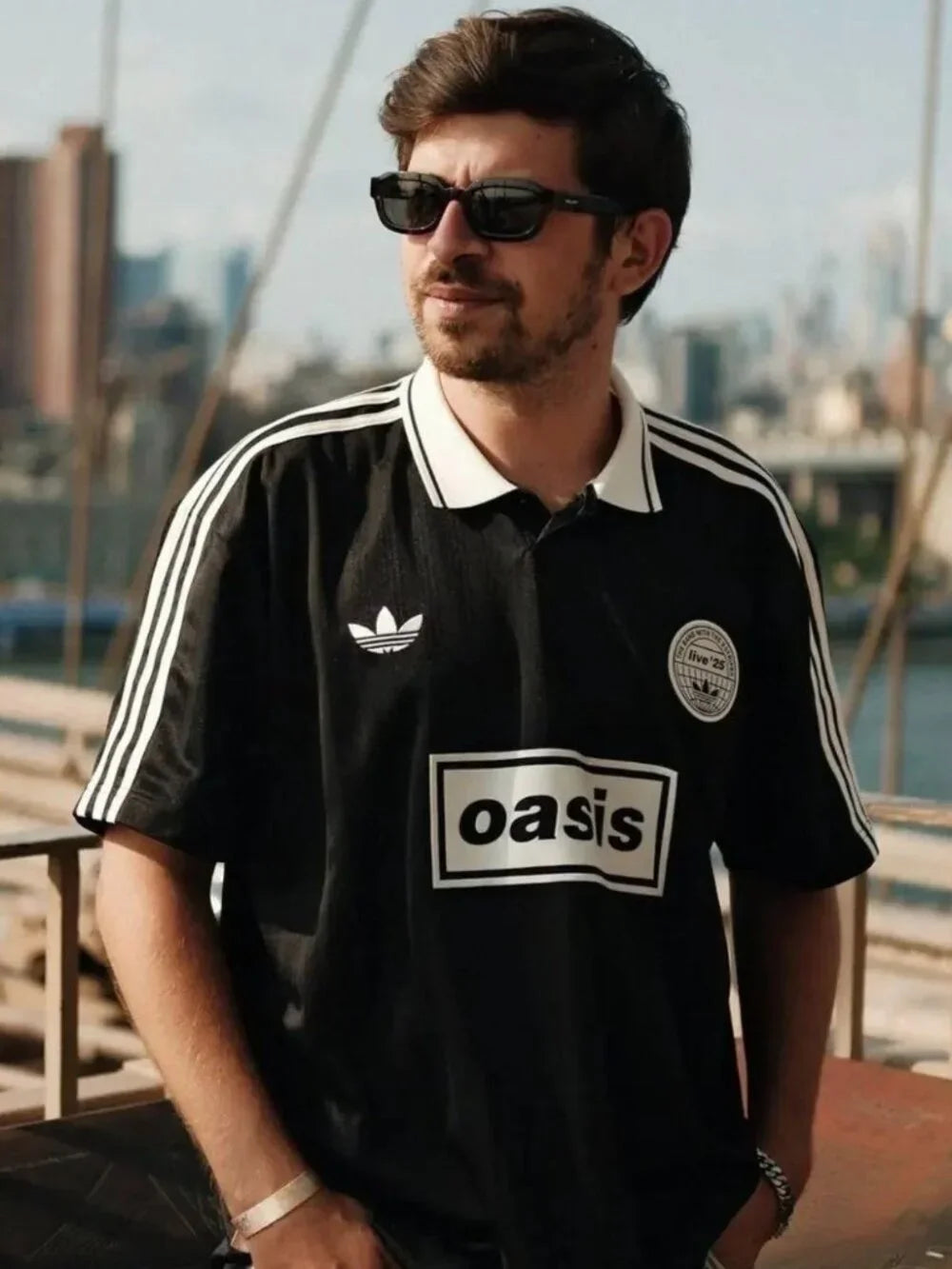 Adidas Oasis Tour lifestyle kit featuring a white short sleeve soccer jersey with Adidas branding and World Cup Retro Soccer Shop logo.