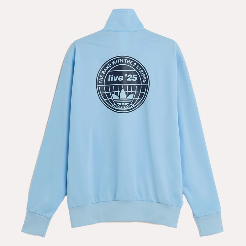 Adidas Original Oasis Tour blue long sleeve tracksuit jacket with sporty design, worn by a model on a plain background.