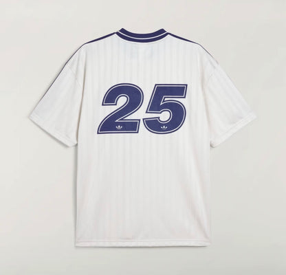 White Adidas OASIS TOUR Lifestyle short sleeve jersey with retro design, displayed on a hanger.