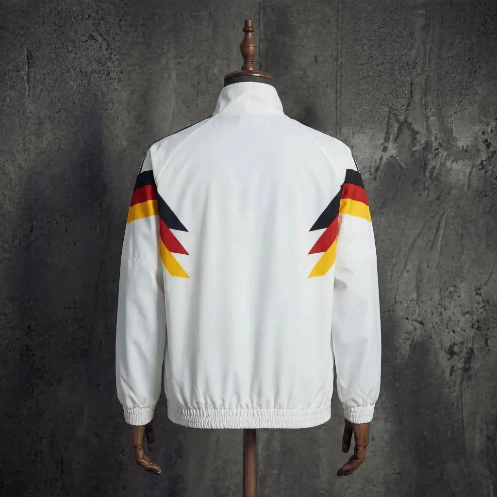Long sleeve West Germany 1990 retro track jacket with classic soccer design, featuring vintage styling and bold colors.