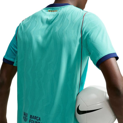 Barcelona FC 2026/27 third short sleeve soccer jersey with team logo and vibrant design, from World Cup Retro Soccer Shop.