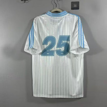 Adidas OASIS TOUR “Bolt Makers Arms” white and sky blue short sleeve soccer jersey, retro World Cup edition.