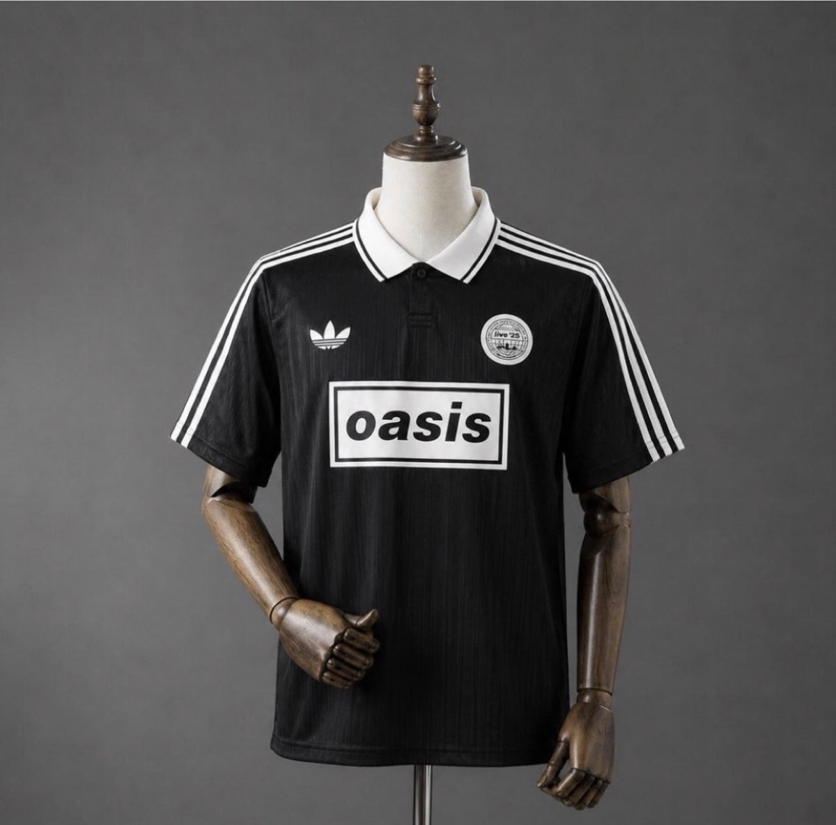 Adidas OASIS TOUR lifestyle short sleeve T-shirt with retro soccer design, featuring classic branding and vibrant colors.