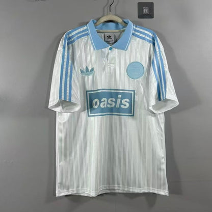 Adidas OASIS TOUR “Bolt Makers Arms” edition white and sky blue short sleeve soccer jersey with team logos.