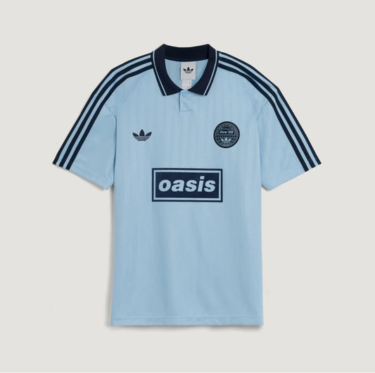 Blue Adidas OASIS TOUR short sleeve jersey from the World Cup Retro Soccer Shop, featuring team and Adidas branding.