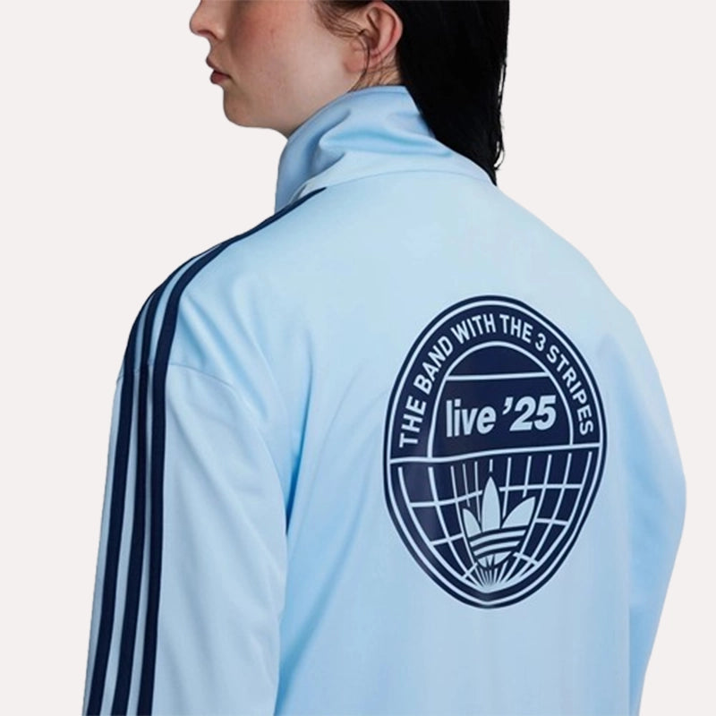 Adidas Original Oasis Tour blue long sleeve tracksuit jacket with logo and sporty design, ideal for casual and athletic wear.