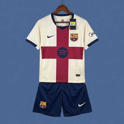 Barcelona 26/27 kids' home soccer kit set including short sleeve jersey, shorts, and socks, featuring team colors and logo.